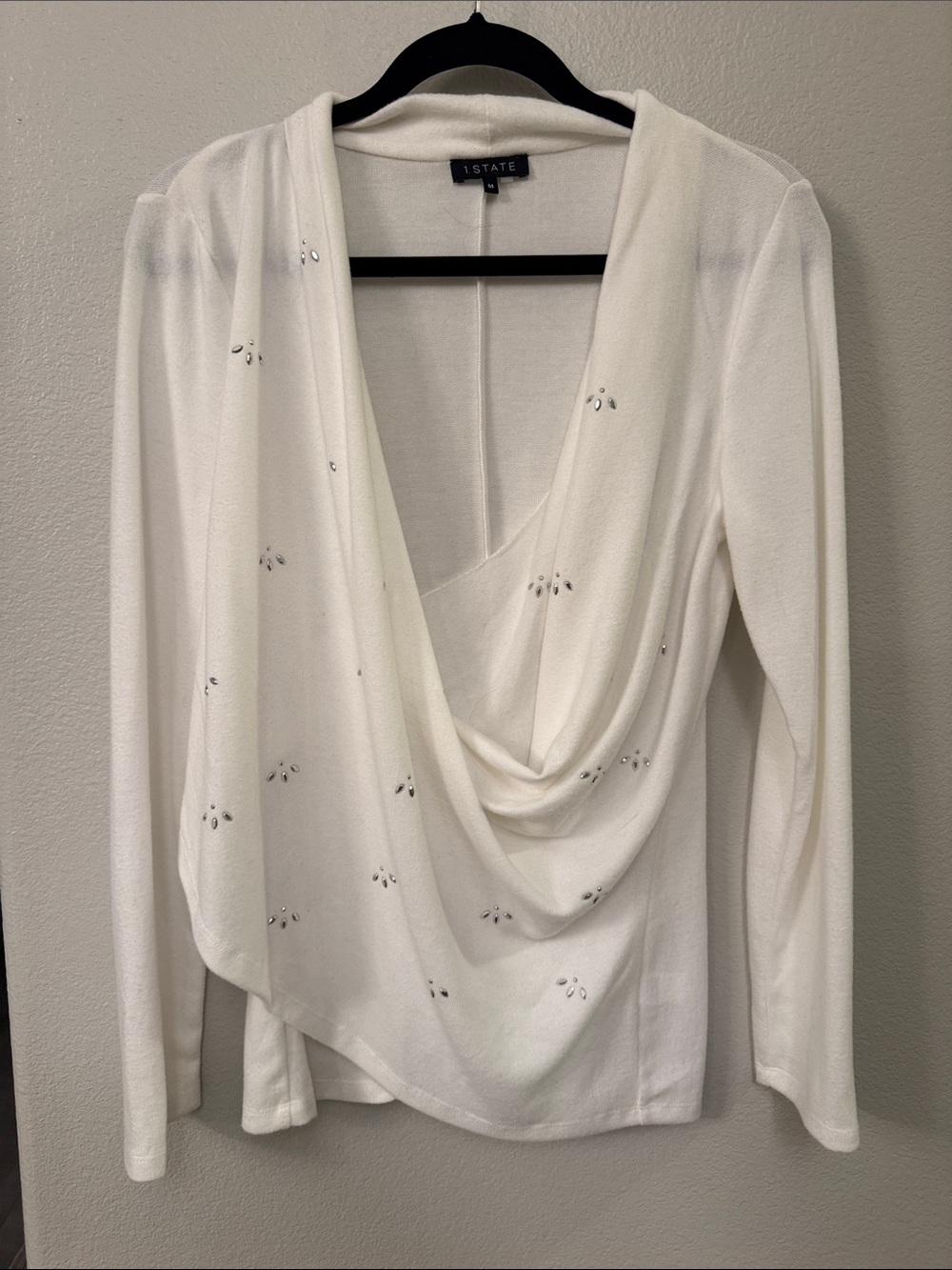 1. State Ivory Draped V-Neck Sweater with Jewel Embellishments